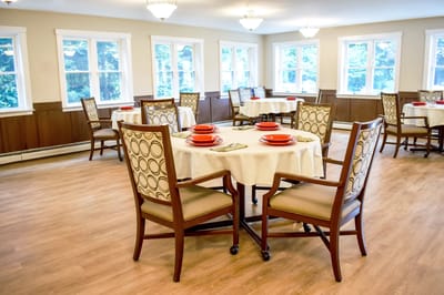 Dining room with tables set for a meal