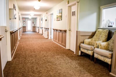 Interior hallway with seating and artwork