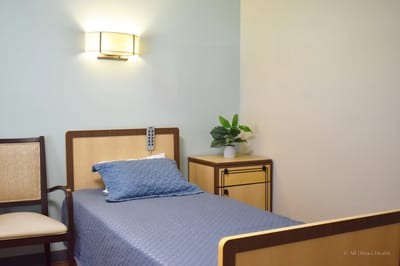 A well-furnished private resident room.