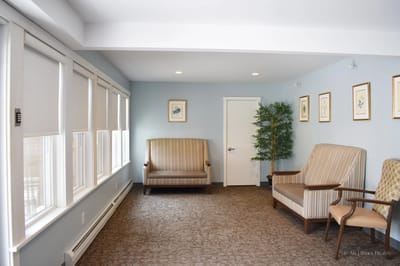 Cozy common area with seating and natural light