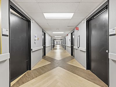 Long corridor with guest room doors