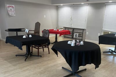 Dining area with tables set for service.