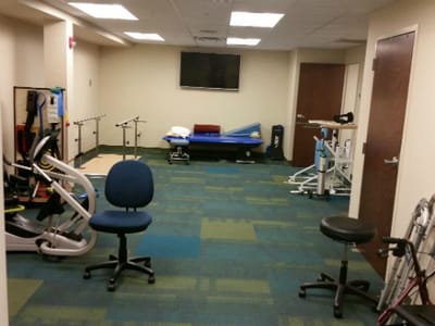 Rehabilitation gym with exercise equipment