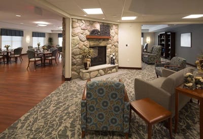 Cozy lounge area with seating and fireplace