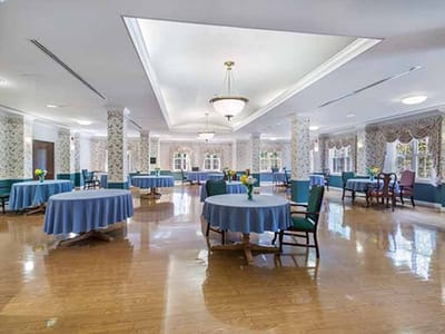 Elegant dining room with round tables and flowers