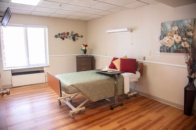 Interior view of a private resident room with decor.