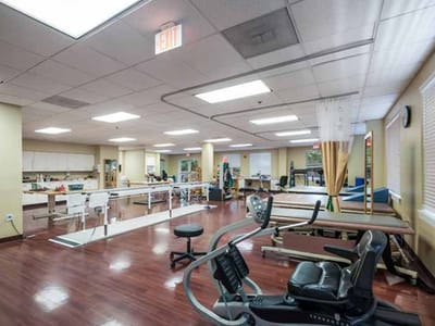 Physical therapy area with exercise equipment