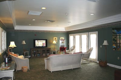 Comfortable lounge area with seating and television.