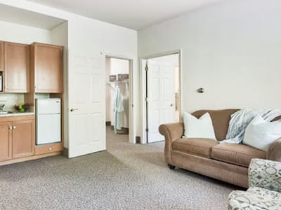 Cozy resident room with kitchen area.