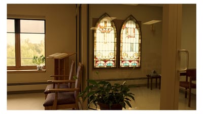 Interior view with stained glass windows and seating
