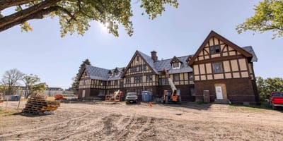 Exterior view of a building under construction.