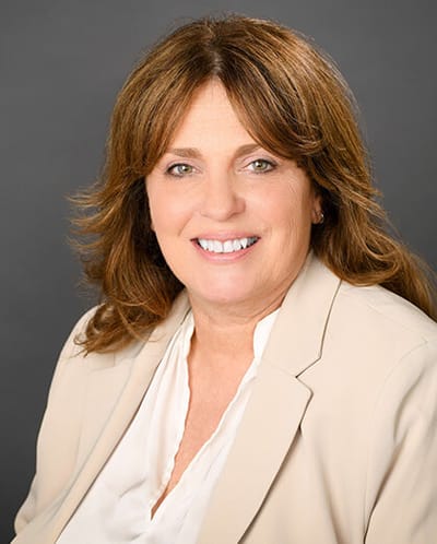 Smiling professional woman in a blazer