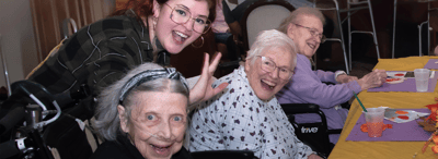 Residents enjoying an activity with staff
