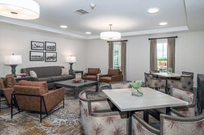 Common area with seating and dining furniture.
