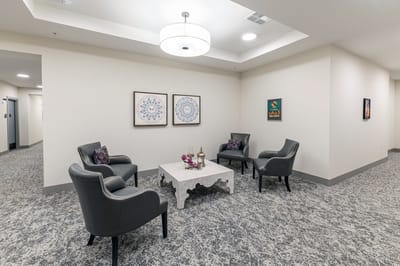 Cozy common area with seating and decorations.