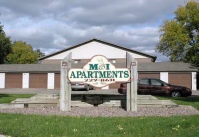 Exterior view of apartment building sign.