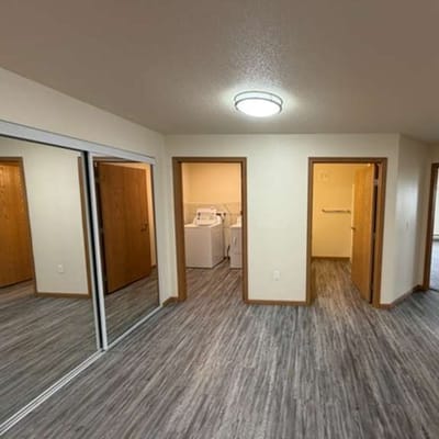 Bright interior room with laundry area