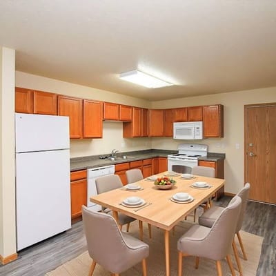 Bright kitchen with dining table set.