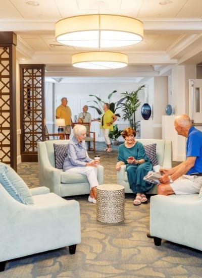 Residents socializing in a cozy common area