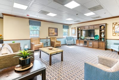Bright common area with comfortable seating and decor
