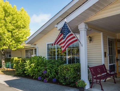 Exterior view of the facility with an American flag