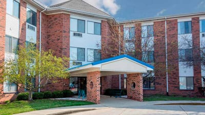 Exterior view of Brenden Gardens entrance with blue awning