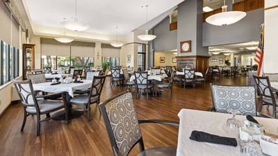 Dining area with tables and chairs arranged elegantly
