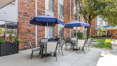 Outdoor seating area with umbrellas at the facility