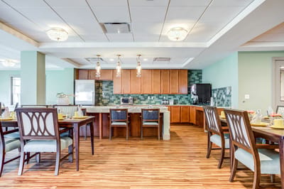 Dining area with wooden tables and modern decor