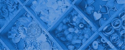 Close-up of a variety of charms and jewelry pieces