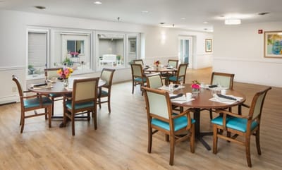 Dining area with tables and flowers