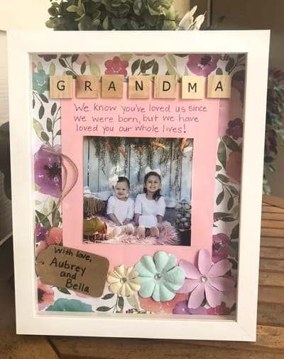 Crafted photo frame with children and heartfelt message.