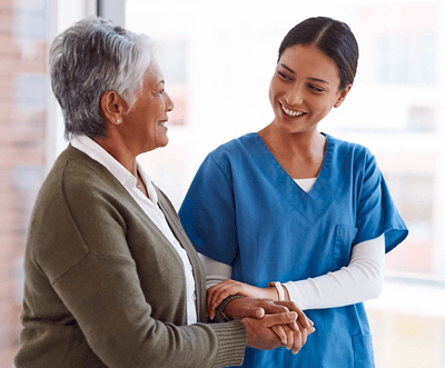 Caregiver interacting with a senior resident