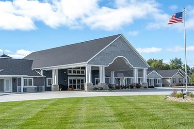 Exterior view of the facility with American flag