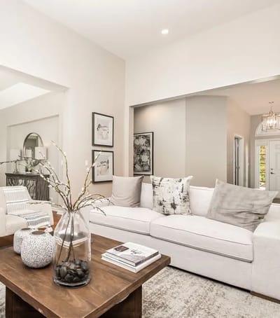 Bright and inviting common area with a sofa.