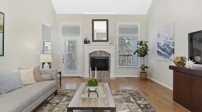 Bright and inviting common area with a cozy sofa
