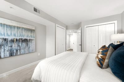 Stylish bedroom interior with decorative artwork