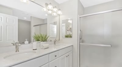 Bright bathroom with modern fixtures and decor.