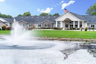 Exterior view of the facility with a water feature.