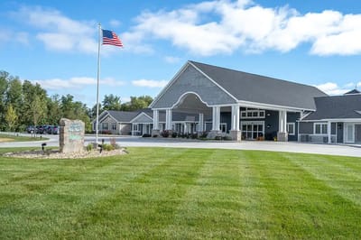 Exterior view of the facility with landscaping.
