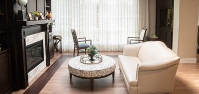 Cozy common area with seating and natural light.