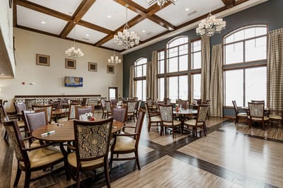 Bright and inviting dining room with large windows