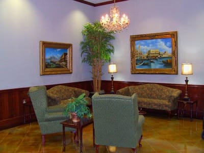 Cozy lobby area with seating and artwork