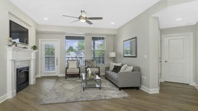 Bright common area with seating and decorations.
