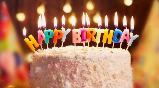 A birthday cake with candles.