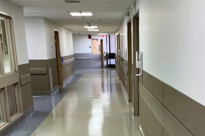 A corridor in the nursing home facility