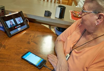 Senior woman engaging in a video call.