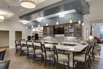 Bright dining area with modern decor and seating