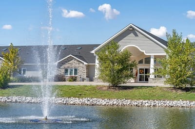 Exterior view of the facility with fountain