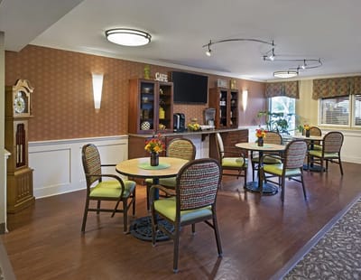 Cozy dining area with tables and flowers